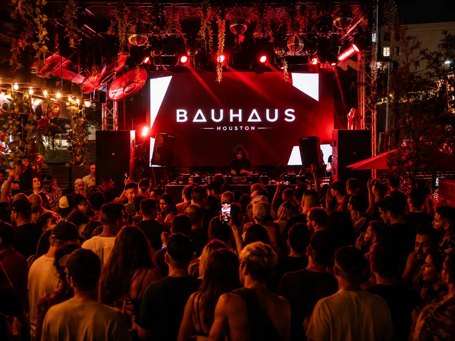 Experience electronic beats and vibrant nightlife at Bauhaus, a premier club in downtown Houston