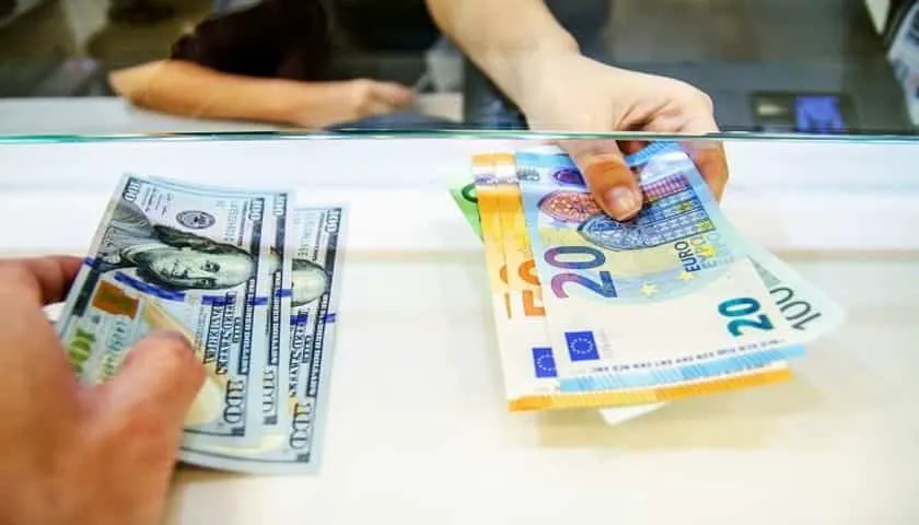 Exchange currency when traveling to another country